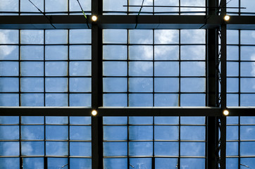 ROOF - View of the blue sky through a glass roof