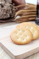 Cracker on woodden background