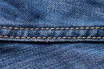 Jeans close-up. Seams. Interlacing the fabric with a close-up