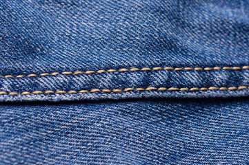 Jeans close-up. Seams. Interlacing the fabric with a close-up