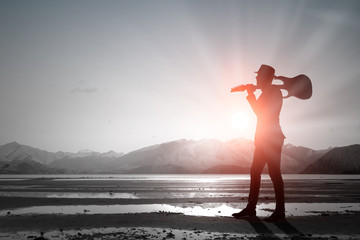 Rock guy with guitar. Mixed media