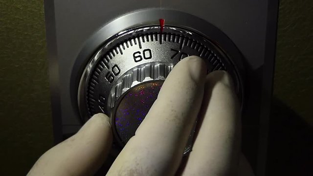 white gloves thief open a safe at night, Small home or hotel.