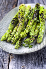 Barbecue green Asparagus as close-up on a plate