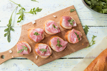 Ham sandwich on wooden board