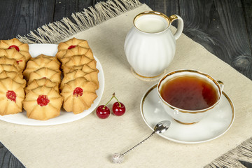 Tea fresh biscuits with cherries