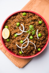 Indian Masala Kheema Pav or khima or Dry Spicy Minced Meat usually served with indian flat bread...