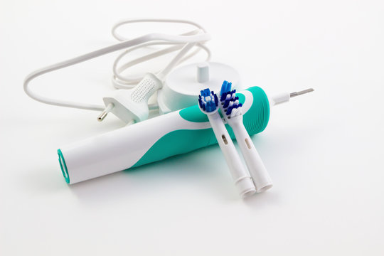 Soft focus toothbrush electric, Dental care tools on white background.