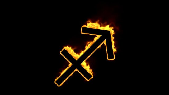 Astrological sign Sagittarius burning on black background