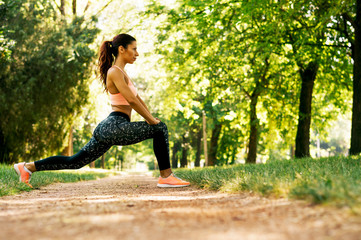 Healthy young woman stretching before fitness and exercise
