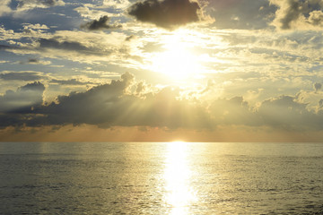 Scenic clouds over the sea at sunset