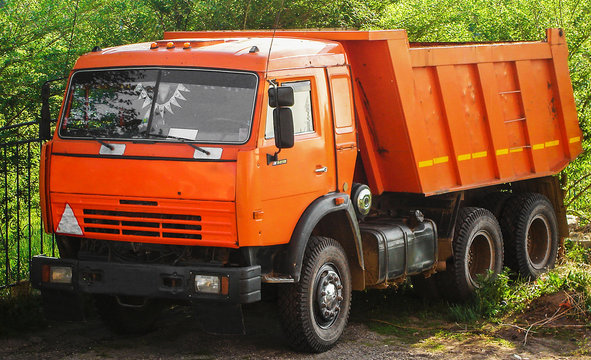 Truck, lorry, orange truck, trucking industry, dumper, tip truck, tip lorry