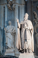 Night view of an external statue in the facade of Saint Agatha Church in Catania, Sicily