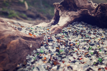 Beautiful pieces of glassy stones in glass beach, California
