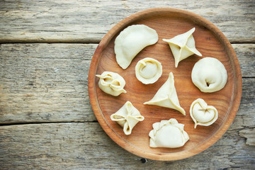 Meat dumplings pelmeni or vareniki with filling