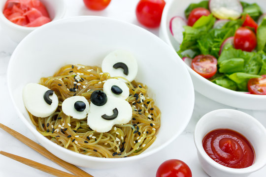 Food art idea for kids - bear pasta from yakisoba, olive and tofu cheese