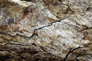 Cracks on the rock of the block