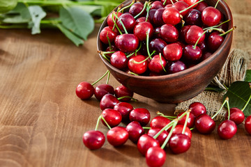 Close up of fresh cherry berries with water drops.