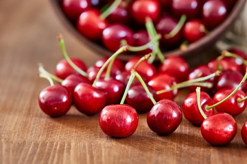 Close up of fresh cherry berries with water drops.