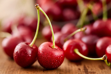 Close up of fresh cherry berries with water drops.
