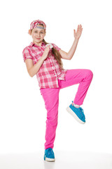 Little girl practicing strokes in karate