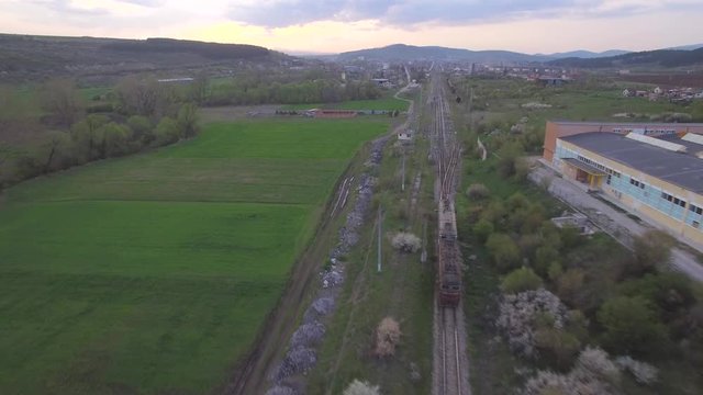Train arrives at the station/ Drone follows train