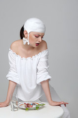 Portrait of a girl who has food from medicines instead of food