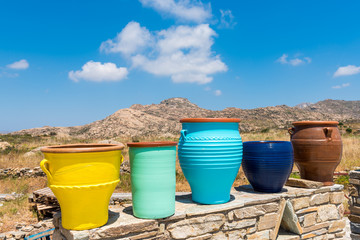 Fototapeta premium Traditional colorful Greek flower pots on Naxos island. Cyclades. Greece 