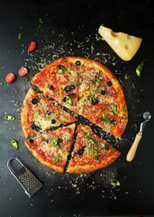Delicious pepperoni pizza with fresh ingredients with chili pepper