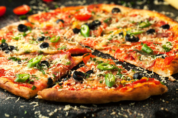 Delicious pepperoni pizza with fresh ingredients with chili pepper