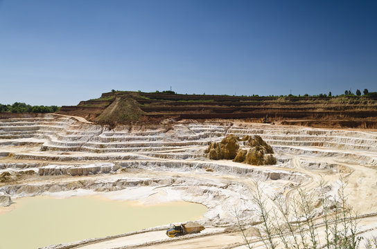 Stone quarry with excavate - Open pit mine