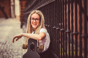 Obraz premium Young girl with dreadlocks