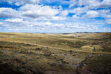 The Wyoming plains under the big blue sky.
