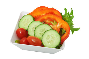 Salad of fresh vegetables In white cup on white background