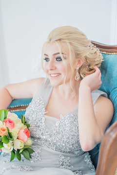 Fashion bride in gray dress with make-up smoky eyes