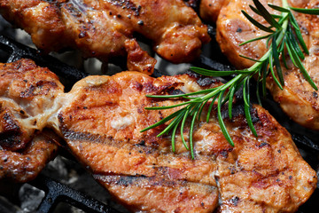 Meat during grilling. Chuck steak with herbs and spices