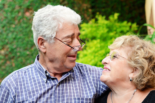 An elderly couple outdoors.
