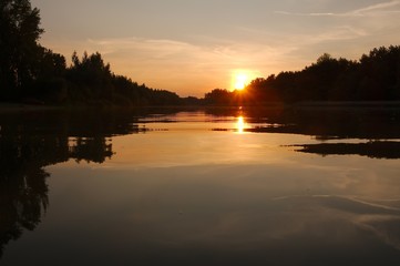 Fototapeta premium Sunset over a river