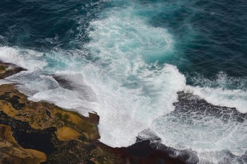 Waves hitting shore