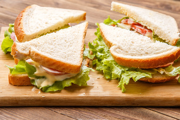 Sandwiches with salad and sausage