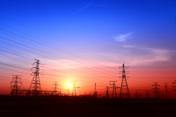 Fototapeta premium High piezoelectric towers, in the setting sun