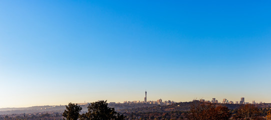 Northcliff view of Johannesburg City Skyline panorama on a winter morning with mist low and clear skies