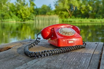 Old telephone in nature