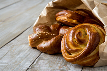 Assortment of baked goods on old wooden table