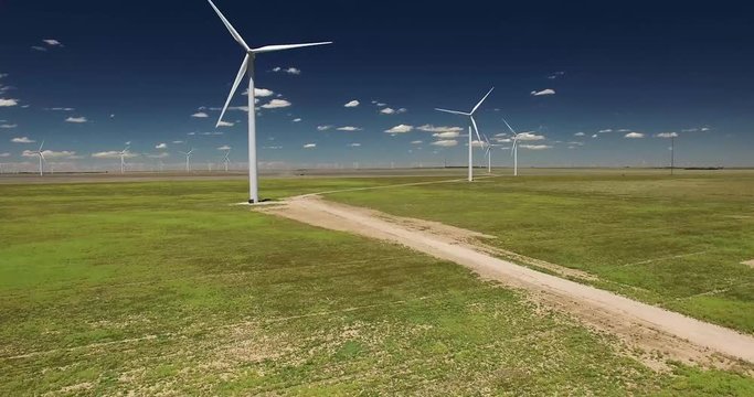 4K drone footage of turbines in wind farm (up and down views)