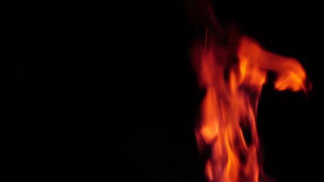 The flame of the fire at night. Slow motion