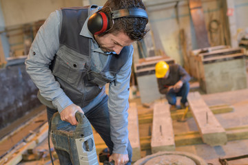 industrial carpenter in workshop