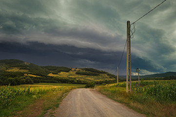 Fototapeta na wymiar storm coming in hillside, Almas, Romania