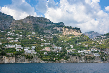 Fototapeta na wymiar Buildings on the cliff on Amalfi coast