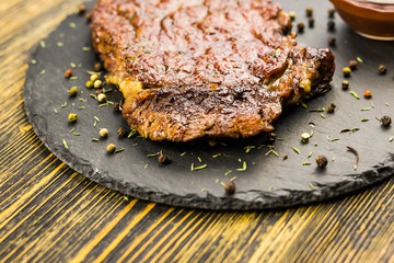 Grilled beef steak with sauce