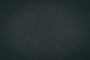 Black leather texture as background.